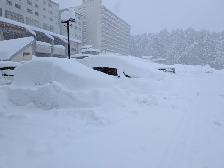 Car completely buried under heavy snowfall